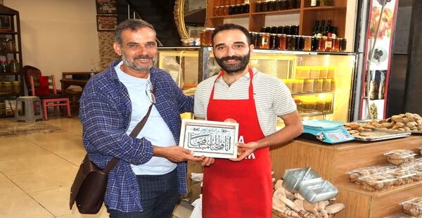 UZUN ÇARŞI ESNAFINA UNUTULMAYACAK MANEVİ HEDİYELER