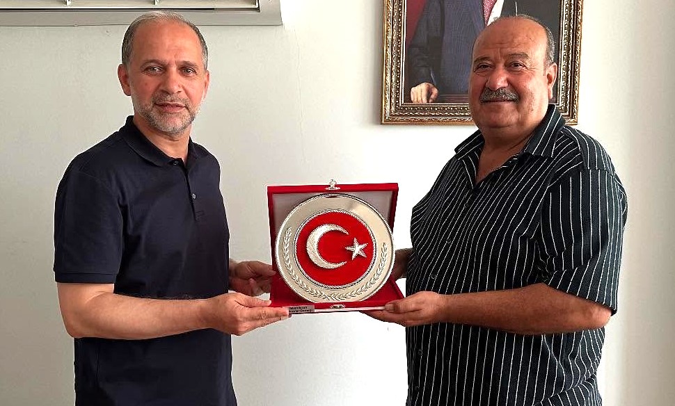 ABDÜLKADİR ÖZEL’E PLAKET